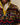 Rowing Blazers Fair Isle Clark Sherpa Multi-Color pullover with a multi-colored Fair Isle pattern and a yellow snap-button placket.