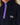 Navy blue Rowing Blazers Clark Sherpa Navy pullover featuring a purple snap-button placket, a chest logo patch, and zippered side pockets.