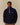 Clark Sherpa Navy pullover in navy blue with a purple snap-button placket and collar.