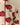 Cream-colored Rowing Blazers Big Apple Classic Sherpa Cream full-zip jacket featuring a repeating red apple print with New York City written on each apple.