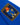 A rectangular patch of Paddington Bear holding a jar of marmalade is stitched onto this royal blue Rowing Blazers x Paddington™ Paddington Duffel Coat Blue.
