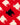 The Warm & Wonderful Cotton Sheep Scarf Diana Red features a classic knit with white sheep on a red backdrop, highlighted by a single black sheep at the center, inspired by Princess Diana’s iconic sweater.